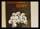 Conrad Atkinson, ‘Colour photograph of a poster depicting skulls and the caption, ‘Remember Derry’’ [c.1974–5]