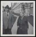 Unknown Photographer, ‘Photograph of Henriette von Motesiczky and a man walking through the grounds of a large house’ [c.1960s]