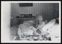 Marie-Louise Von Motesiczky, ‘Photograph of Henriette von Motesiczky sitting up in bed pouring a cup of tea on a tray beside her’ [c.1960s]