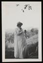 Unknown Photographer, ‘Photograph of Henriette von Motesiczky standing in a field with a hand to her mouth’ [c.1900s]