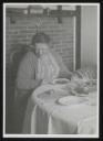 Unknown Photographer, ‘Photograph of Henriette von Motesiczky sitting at a table eating ’ [c.1940–50s]