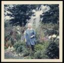 Unknown Photographer, ‘Photograph of Marie-Louise von Motesiczky standing in a garden amongst flowers ’ [c.1970s]