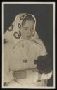 Marie-Louise Von Motesiczky, ‘Photograph of Marie-Louise von Motesiczky wearing a white lace-trimmed dress, carrying flowers and wearing a headscarf’ [c.1920s–1930s]