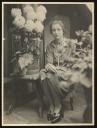Unknown Photographer, ‘Photograph of Marie-Louise von Motesiczky seated next to a small table holding a large pot of flowers ’ [c.1920s–1930s]
