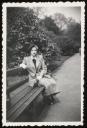 Unknown Photographer, ‘Photograph of Marie-Louise von Motesiczky sitting on a bench in front of a rhododendron bush’ [c.1930s–1940s]