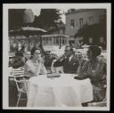 Unknown Photographer, ‘Photograph of Marie-Louise von Motesiczky, Kees Leembruggen and Sophie Brentano sitting on a table at outdoor café’ [1930s]