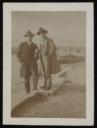 Unknown Photographer, ‘Photograph of Theo Garve and Karl Tratt standing together in front of a harbour ’ [1927–8]  