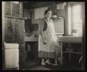Unknown Photographer, ‘Photograph of Marie Hauptmann standing in a kitchen ’ [c.1940s]