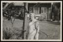 Unknown Photographer, ‘Photograph of Marie Hauptmann standing next to an arbour in a garden ’ [c.1940s–1954] 