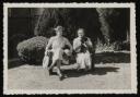 Unknown Photographer, ‘Photograph of Marie Hauptmann and Marie-Louise von Motesiczky seated on a garden bench with two dogs ’ [c.1940s–1954] 