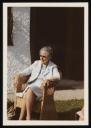 Unknown Photographer, ‘Photograph of Käthe von Porada sitting in an armchair beside a white building’ August 1973 