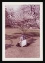 Unknown Photographer, ‘Photograph of Mathilde Beckmann kneeling under a tree with a dog ’ 1958