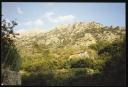 Marie-Louise Von Motesiczky, ‘Photograph of a house at the base of a rocky mountain in Majorca’ [1988]