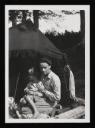 Anonymous, ‘Photographs of Ben Nicholson sat under a shelter with Jake Nicholson on his lap’ [c.1932]