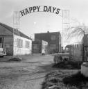 John Piper, ‘Photograph of Happy Days sign near Maldon, Essex’ [c.1930s–1980s]