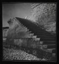 Eileen Agar, ‘Photograph of some steps leading down to a pebble beach’ [1930s]