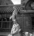 Eileen Agar, ‘Photograph of Joseph Bard next to a statue in Bath’ [1930s]