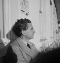 Eileen Agar, ‘Photograph of Joseph Bard sitting outside a house’ 1930s–1940s