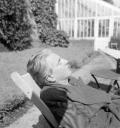 Eileen Agar, ‘Photograph of Joseph Bard asleep in a deckchair next to a conservatory’ [8 July 1947]