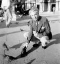 Eileen Agar, ‘Photograph of Joseph Bard feeding the pigeons in St Mark’s Square, Venice’ September 1949