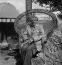 Eileen Agar, ‘Photograph of Joseph Bard sitting on a wicker chair at Sitio Litre, Puerto de la Cruz, Tenerife’ 1956