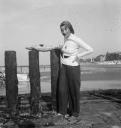 Joseph Bard, ‘Photograph of Eileen Agar standing by a harbour with a rubber shark’ September 1938