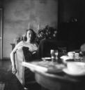 Eileen Agar, ‘Photograph of Mary Oliver sitting at a table in her home, Pembroke Lodge, Richmond’ [1930s]