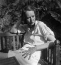 Eileen Agar, ‘Photograph of Mary Oliver sitting on a bench at her home, Pembroke Lodge, Richmond’ [1930s]
