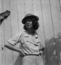 Eileen Agar, ‘Photograph of Mary Oliver wearing a tin hat taken at her home, Pembroke Lodge, Richmond’ [1939–40]