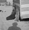 Joseph Bard, ‘Photograph of Eileen Agar sitting in the sand next to a beach hut’ September 1938