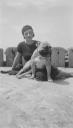 Joseph Bard, ‘Photograph of Eileen Agar sitting by the beach in Bridport with her dog, Dandy’ 1934