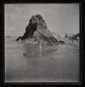 Eileen Agar, ‘Photograph of people climbing a slab rock on the beach’ [1936]