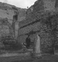 Eileen Agar, ‘Photograph of a man walking amongst ruins in Rome’ 1949