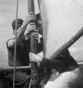 Eileen Agar, ‘Photograph of David and Simone Dear working a sail onboard a boat’ [1939]