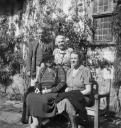 Eileen Agar, ‘Photograph of Joseph Bard, Ethel Le Rossignol and others outside Miss Le Rossignol’s house’ [1930s]