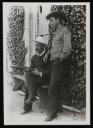 Anonymous, ‘Glass negative photograph showing Henry Scott Tuke and Johnny Jackett outside Tuke’s house at Pennance’ [c.1896]