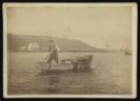Anonymous, ‘Mounted photograph of Jack Rolling sculling a dinghy’ [c.1885]
