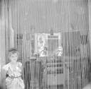 Nigel Henderson, ‘Photograph of an unidentified young girl outside a shop’ [1949–54]