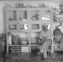 Nigel Henderson, ‘Photograph of an unidentified man inside a shop or kitchen’ [c.1951–2]