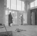 Nigel Henderson, ‘Photograph of an unidentified man standing in a doorway’ [c.1951–2]