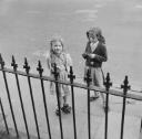 Nigel Henderson, ‘Photograph of two unidentified girls playing outside’ [1949–54]