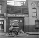 Nigel Henderson, ‘Photograph of a milk cart outside George Sampson Ltd’ [1949–54]