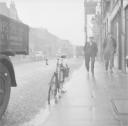 Nigel Henderson, ‘Photograph of two unidentified men walking along a pavement’ [1949–54]