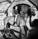 Eileen Agar, ‘Black and white glass lantern slide of Julian Mackintosh on a horse’ [c.1930–60]