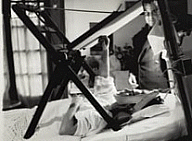 Frida Kahlo painting in bed, 1940