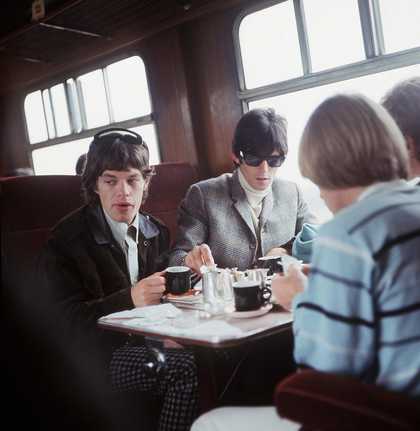 The Rolling Stones - Mick Jagger and Keith Richards with Brian Jones (back to camera) 1967 