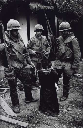 Shell-shocked soldier awaiting transportation away from the frontline, Hue, McCullin, Don