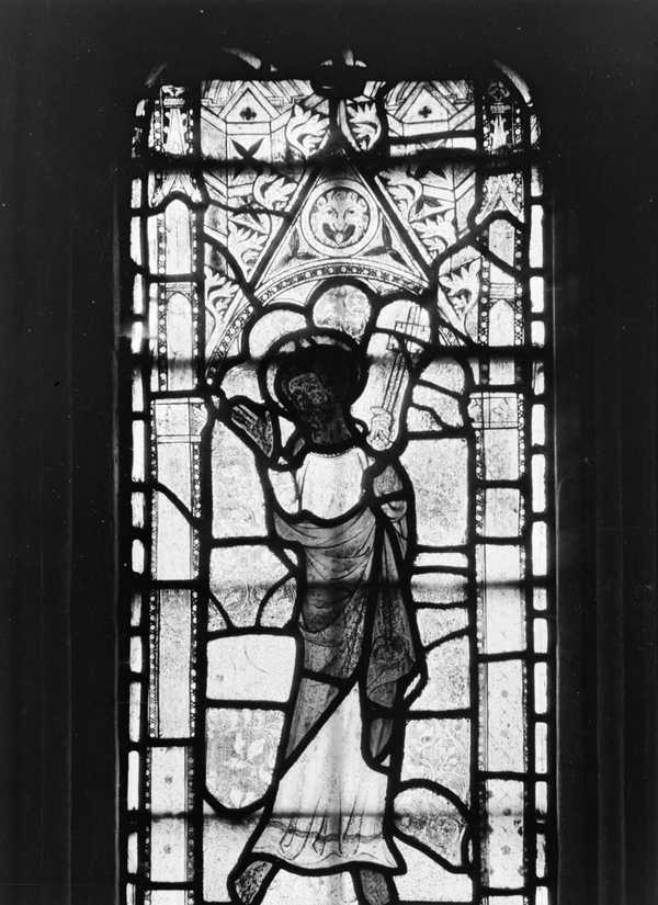 Photograph of detail of stained glass window at St Bartholomew’s Church in Brightwell Baldwin