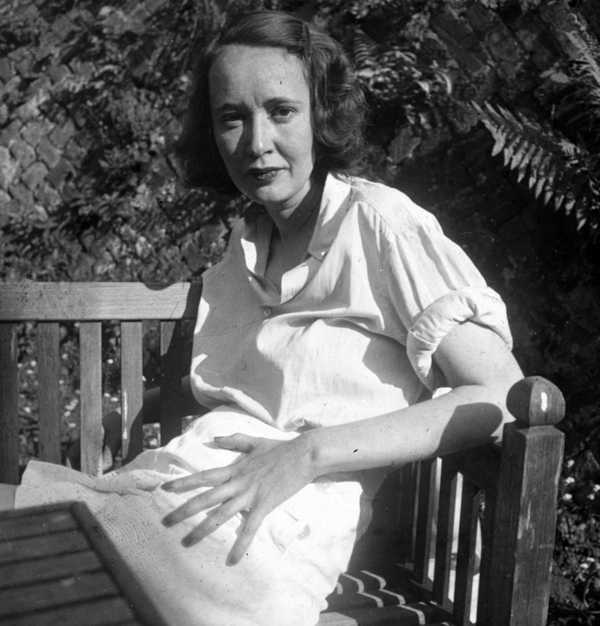 Black and white glass lantern slide of Mary Oliver on a bench‘, Eileen