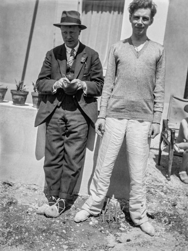 Black and white negative of Clive Bell and Raymond Mortimer standing in ...